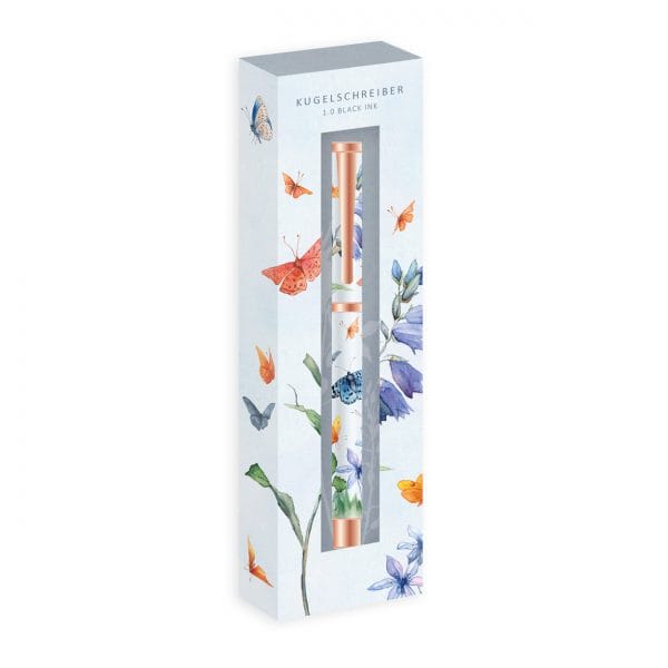 Bolígrafo en caja con diseño floral y de mariposas, etiquetado "Kugelschreiber" y "1.0 Black Ink".