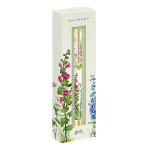 Un bolígrafo de gel decorativo en una caja de temática floral con ilustraciones de flores rosas, blancas y azules.
