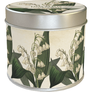Una lata redonda de metal con un diseño floral con lirios del valle en los lados y la tapa.