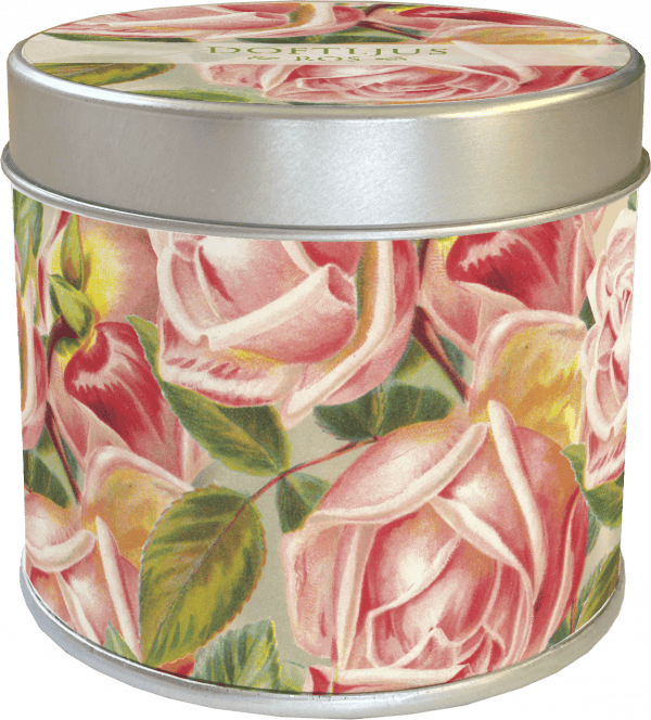 Una lata redonda de metal con un diseño floral con rosas rosadas y hojas verdes.