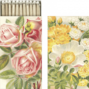 Caja de cerillas con diseños florales ilustrados, con flores rosas y amarillas en la tapa.