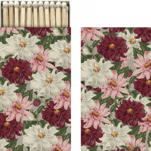 Una caja de cerillas con diseño floral, con flores rojas, blancas y rosas sobre un fondo gris. Las cerillas se ven en la parte superior.