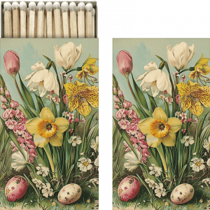 Una caja de cerillas abierta que presenta un diseño floral con tulipanes, narcisos y huevos moteados en la tapa.