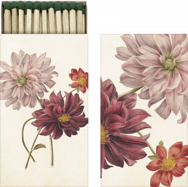 Caja de cerillas con diseño floral con flores rosas y rojas en la tapa.