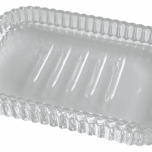 Jabonera rectangular de vidrio transparente con bordes biselados y base ranurada, ligeramente inclinada para mostrar profundidad y detalles.