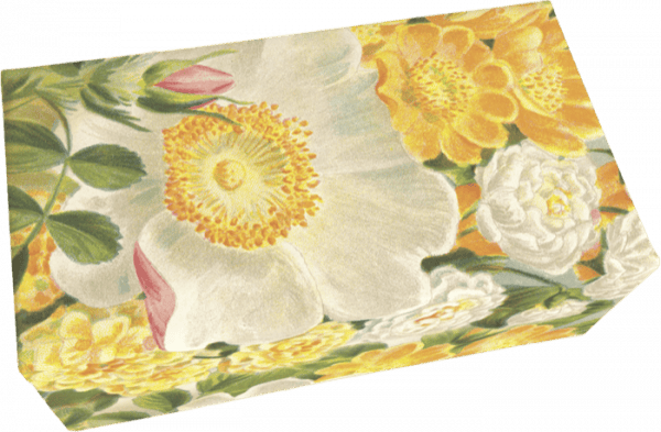 Caja rectangular con diseño floral con grandes flores blancas y amarillas, y hojas verdes.