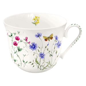 Taza de té blanca con motivos florales y de mariposas en rosa, morado y amarillo.