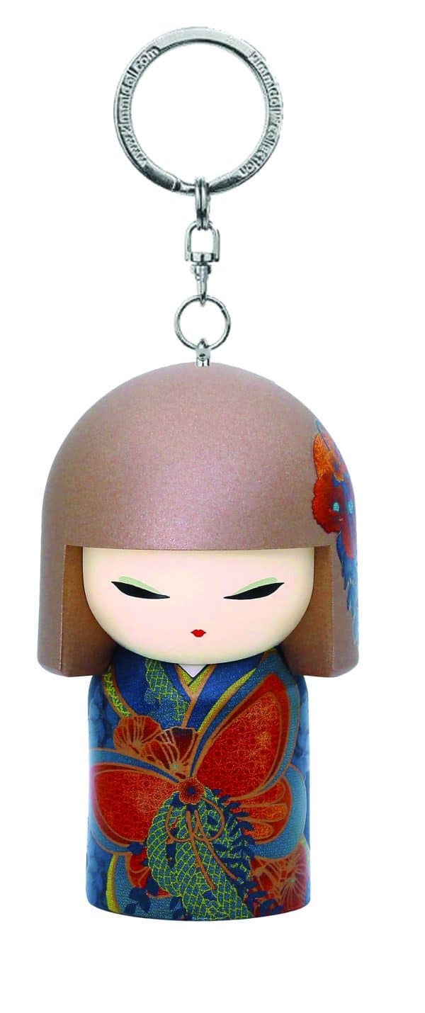 Llavero que presenta una muñeca Kokeshi con un corte de pelo bob marrón y un colorido atuendo floral tradicional.