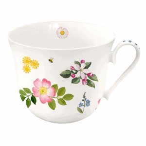 Taza de té de porcelana blanca decorada con motivos florales de colores, hojas verdes y una pequeña abeja, con asa curvada.
